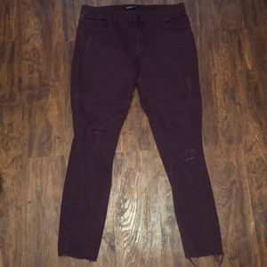 Maroon, distressed, mid-rise, skinny ankle jeans.